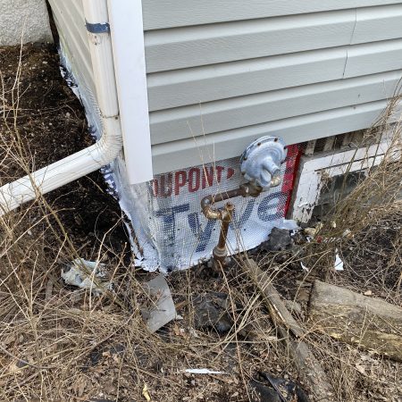 House-Wrapped Section of Foundation W/ Wire